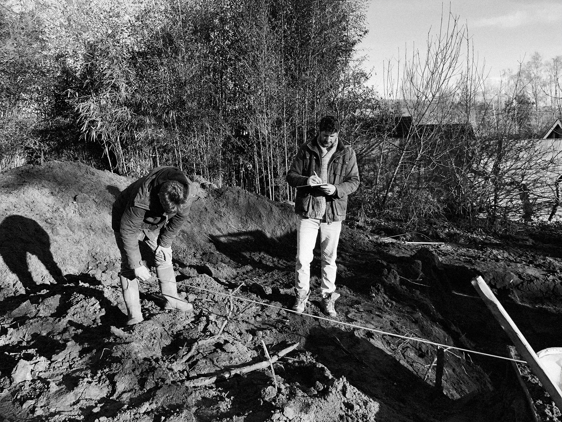 The measurement of the site takes place, and an outline of garden drainage other issues that may affect the design are considered